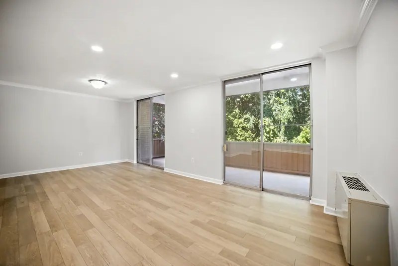Condo living room with balcony doors in Bethesda, MD