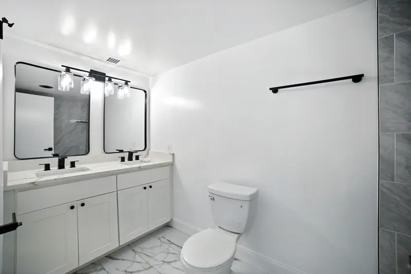 Renovated double-vanity bathroom in a Bethesda, MD condo