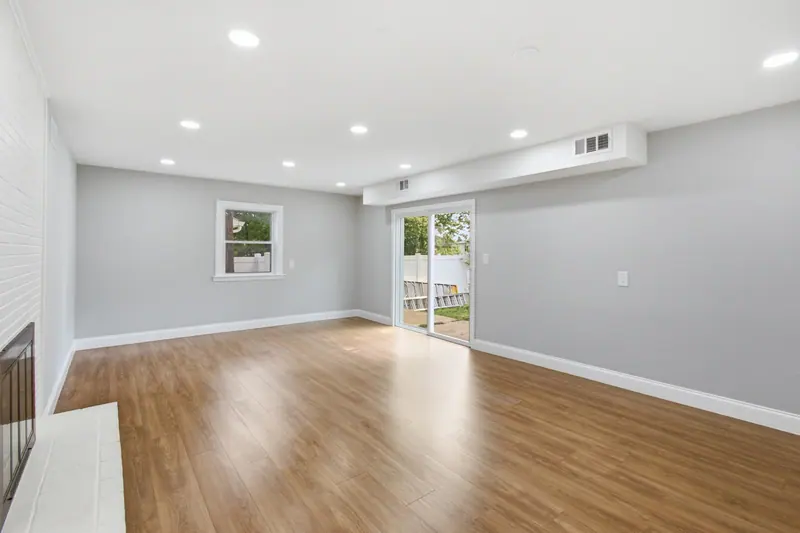 Empty family room before virtual staging, New Carrollton, MD
