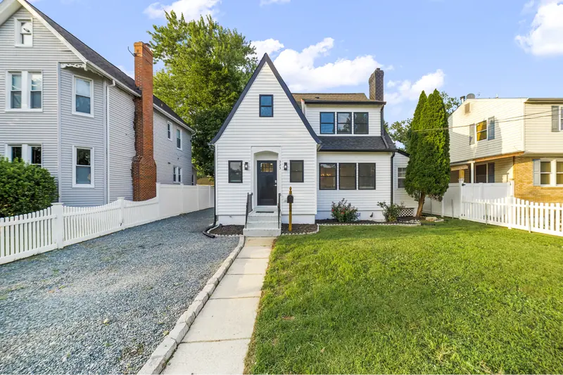 Front exterior of a renovated cape cod in Laurel, MD
