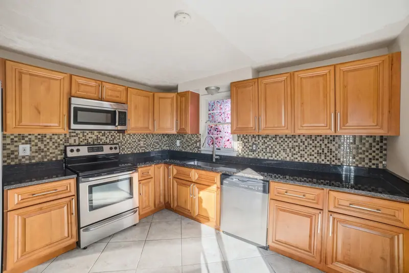 Kitchen with wood cabinets in Upper Marlboro, MD