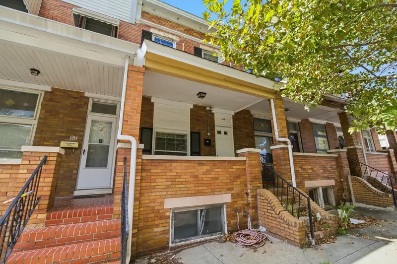 Brick rowhome porch exterior in Baltimore, MD