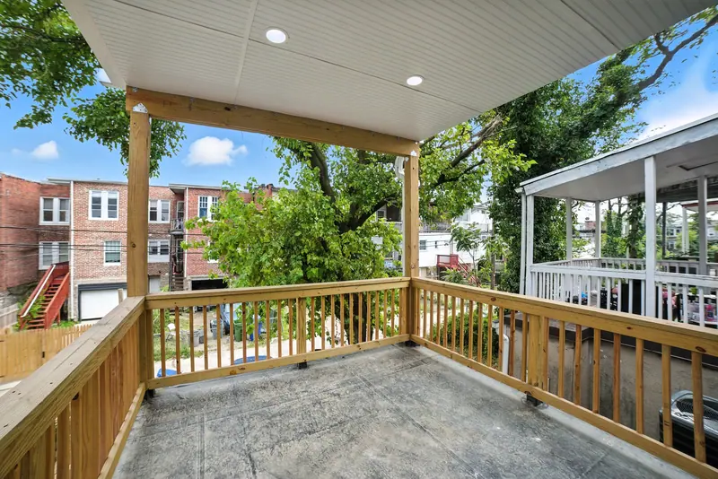 Covered rear deck of a Baltimore, MD rowhome