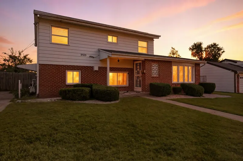 Split-level home at twilight in Baltimore, MD