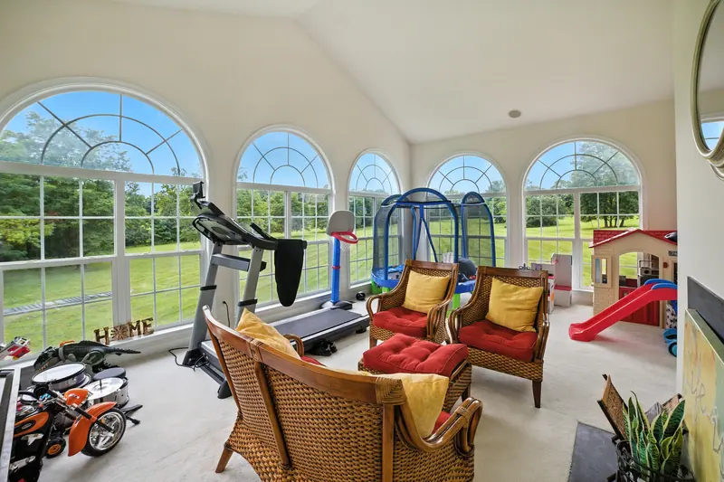 Sunroom with arched windows in Leesburg, VA